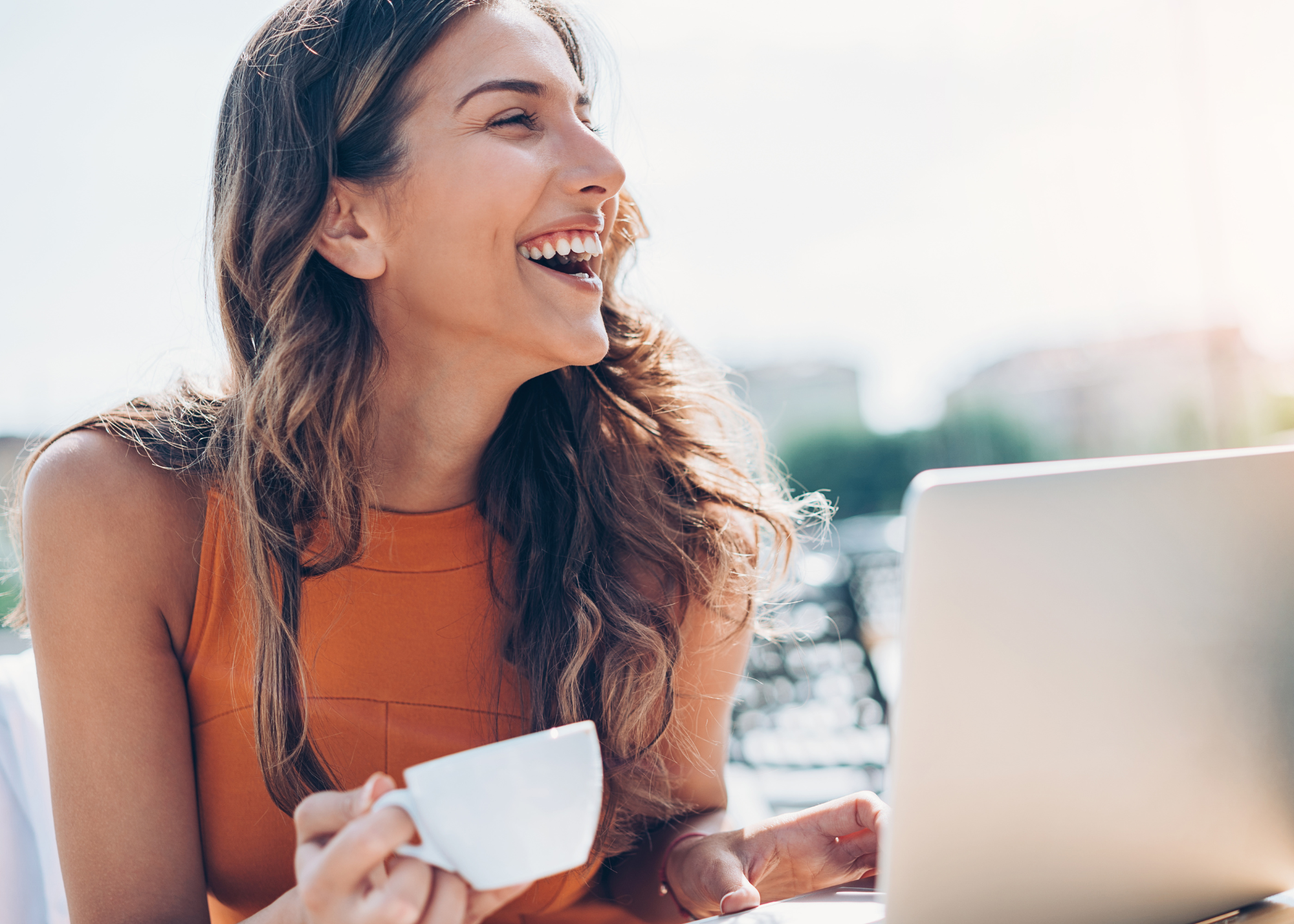 happy woman coffee computer